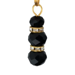Pinces à mamelons dorées avec des perles noires