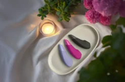 Womanizer Enhance - Duo clitoridien air et vibration - Noir