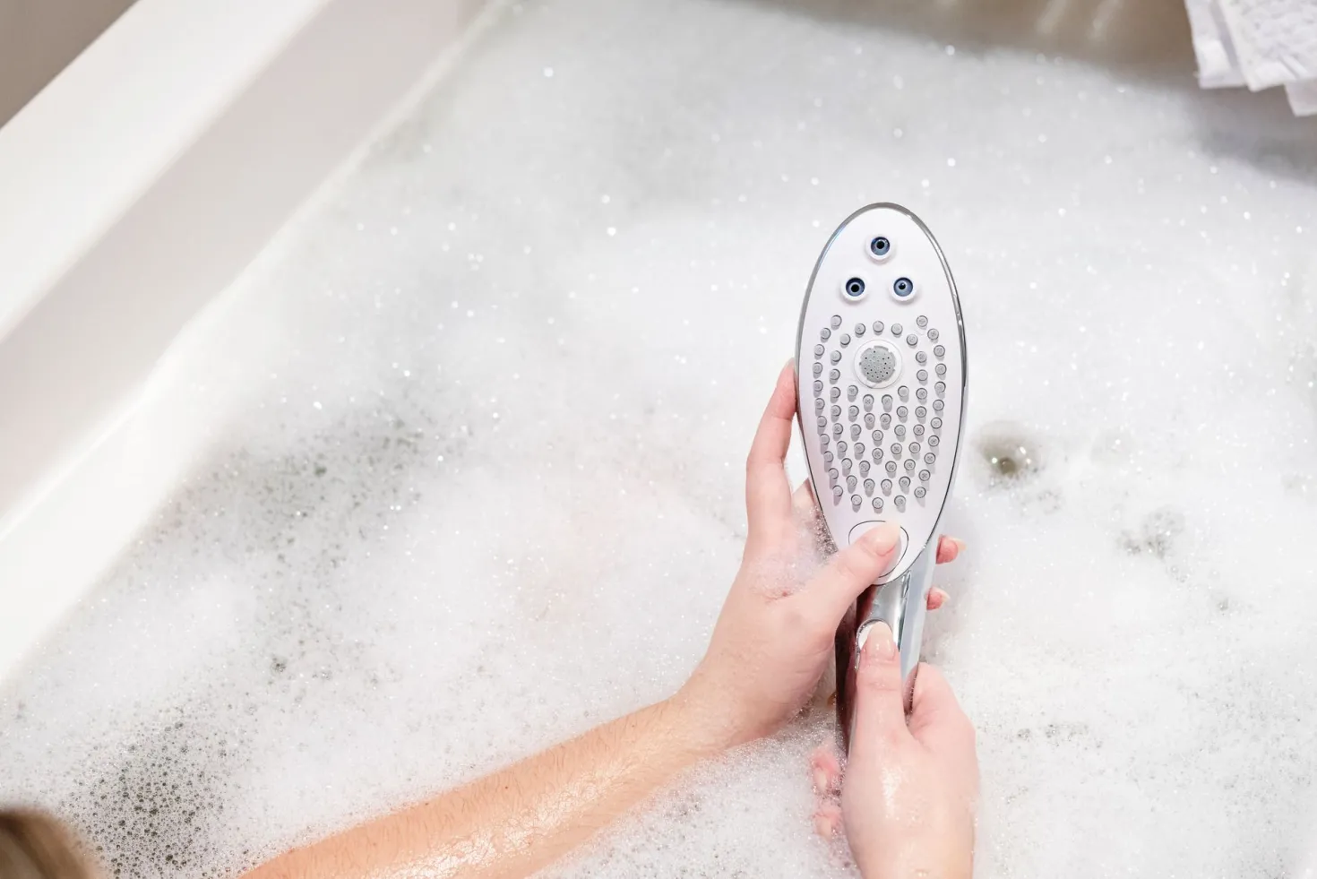 Womanizer Wave - Pommeau de douche pour stimulation clitoridienne - Chrome
